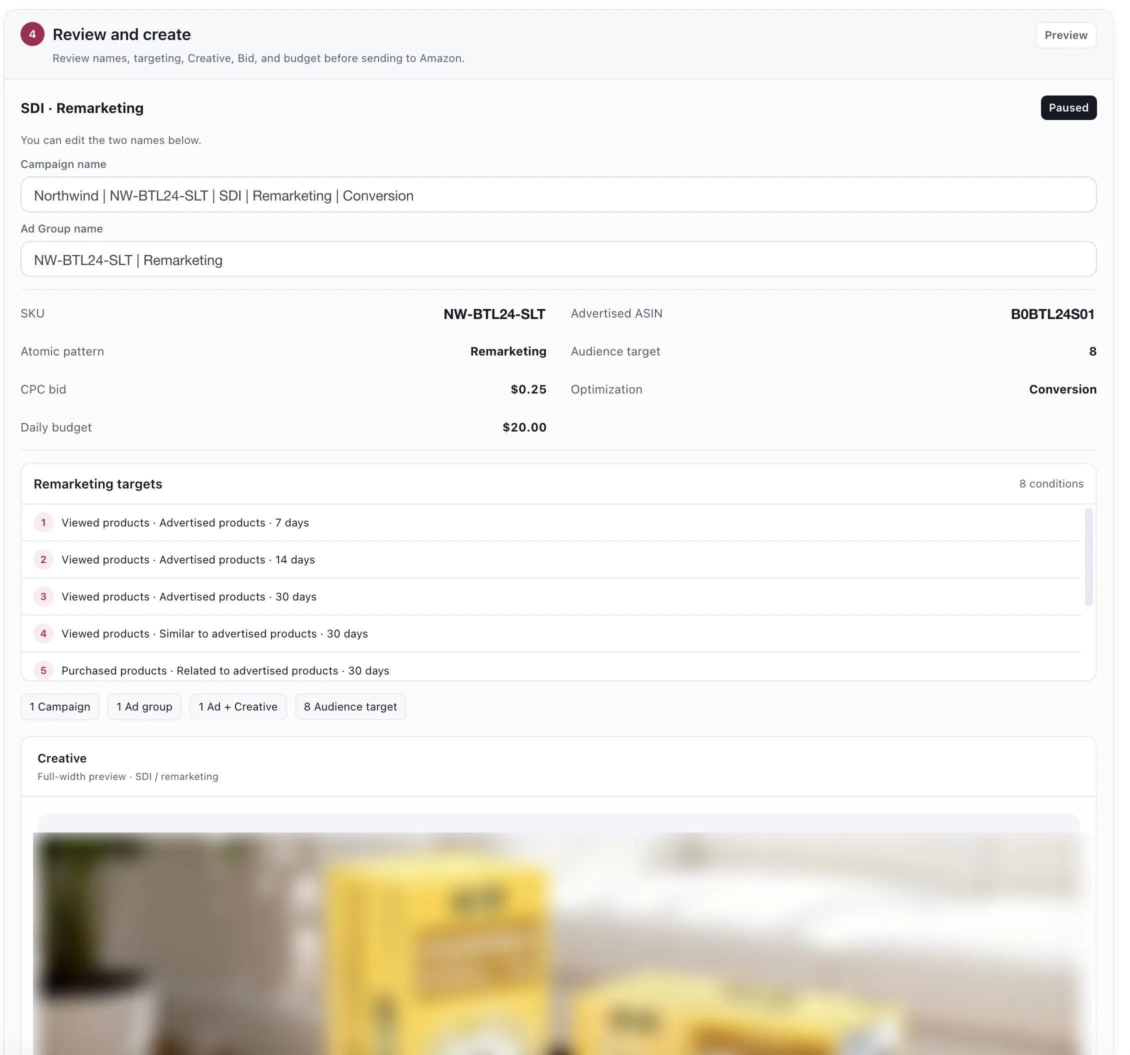 The Review and create step for a campaign row. It shows the campaign and ad group names as editable fields, the SKU, advertised ASIN, atomic pattern, CPC bid, daily budget, audience target count and optimization, a list of the remarketing targets it will write, counts of what will be created, and a full-width creative preview. Names, SKU and ASIN are demo replacements; the creative is blurred.